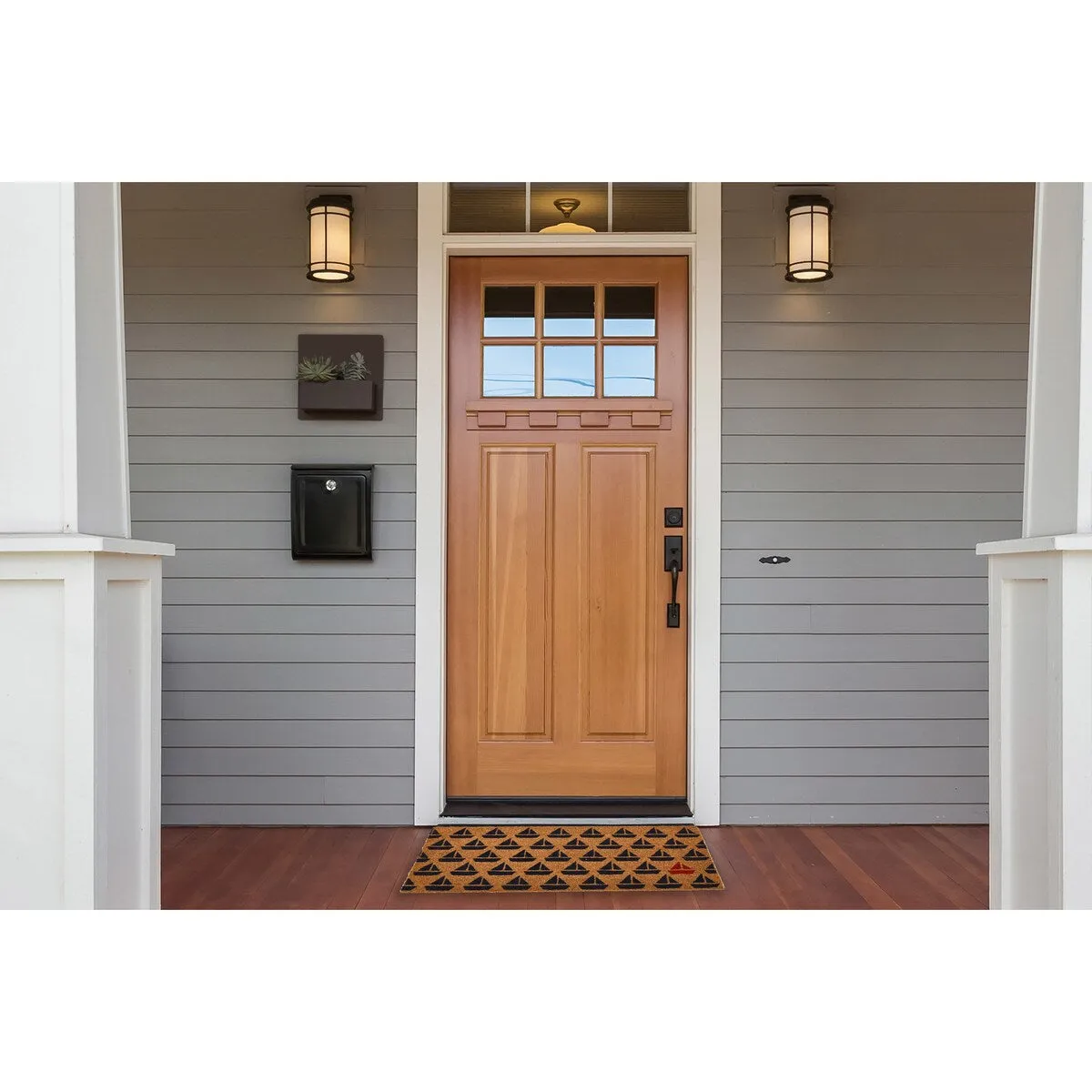 Coir Entry Doormat with Coastal or Nautical Sailboat Design and non-slip liner backing. Natural Finish