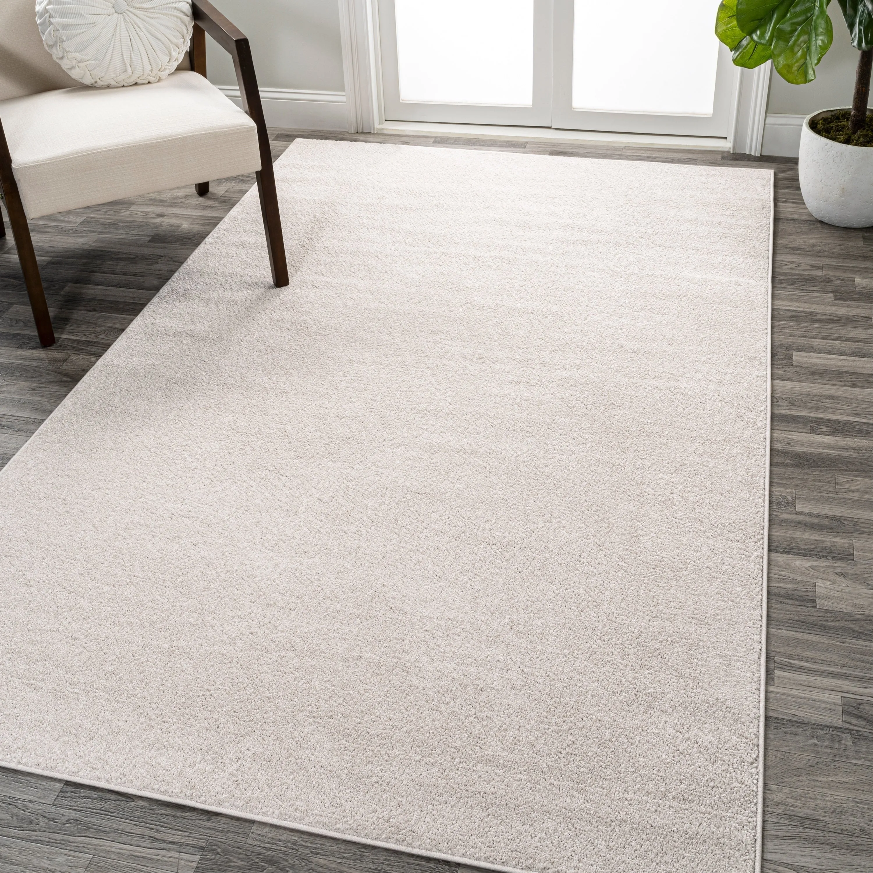 JONATHAN Y Tumbling Solid Low-Pile Area Rug
