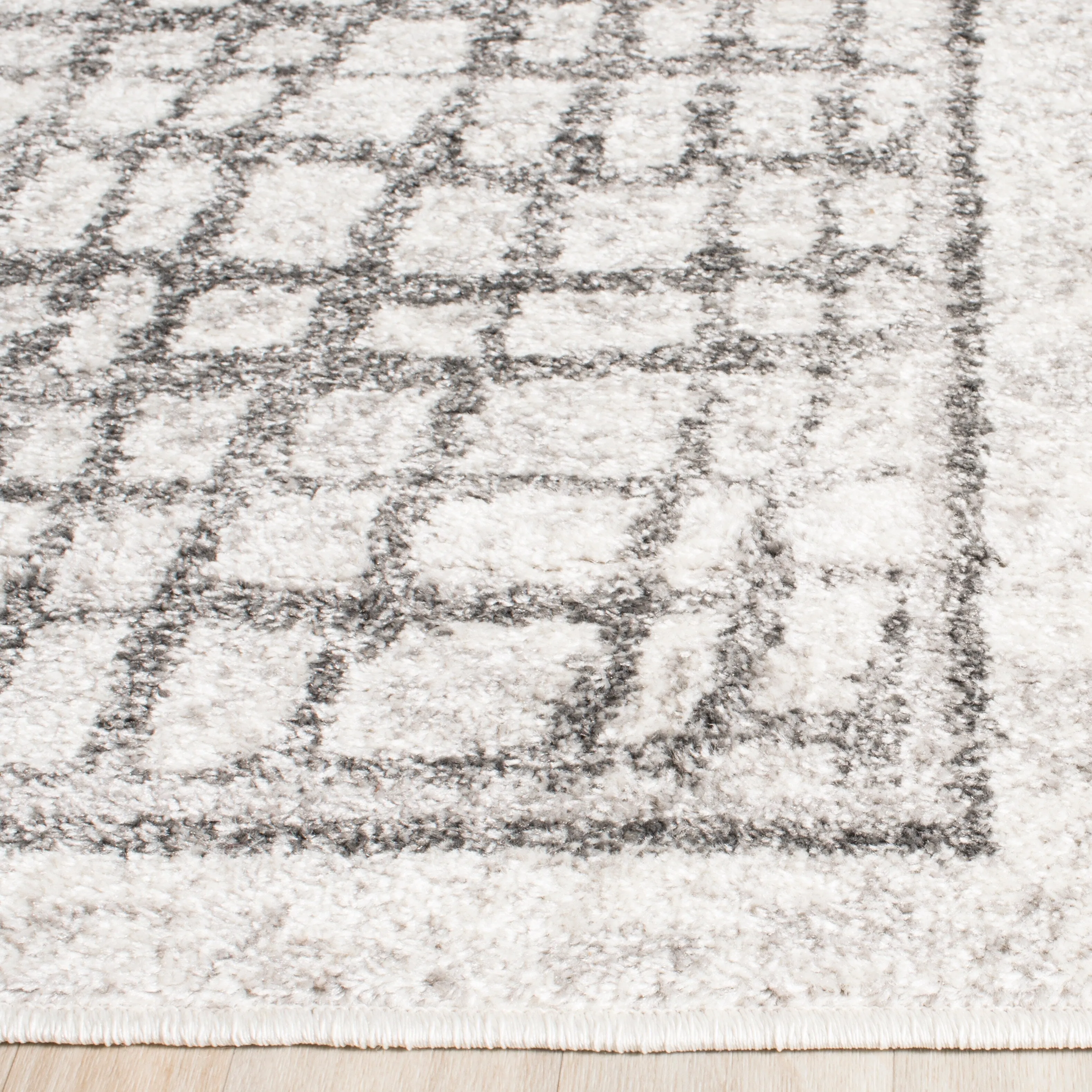 SAFAVIEH Adirondack Zoltanne Grid Distressed Rug