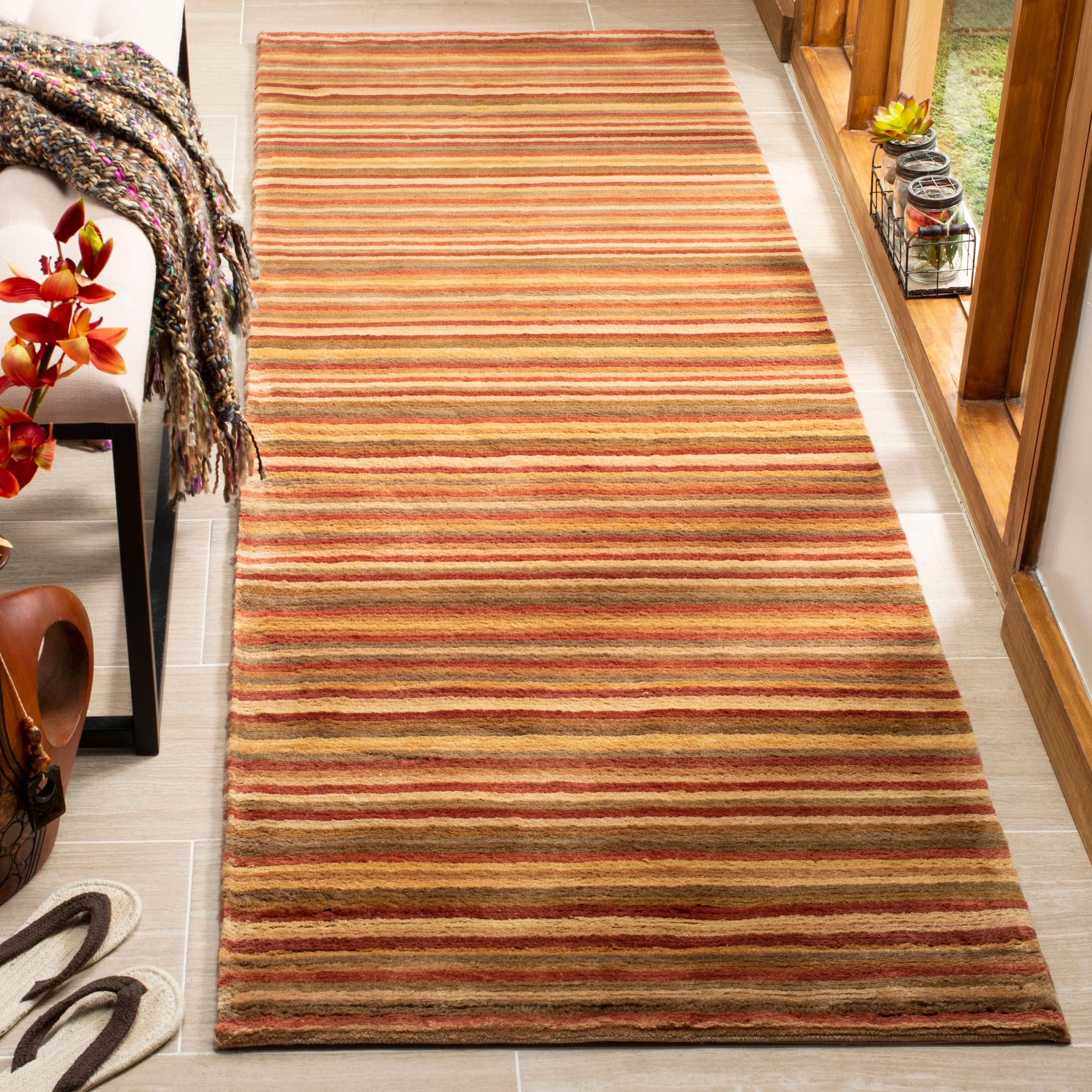 SAFAVIEH Couture Hand-knotted Tibetan Soledade Modern Wool Rug with