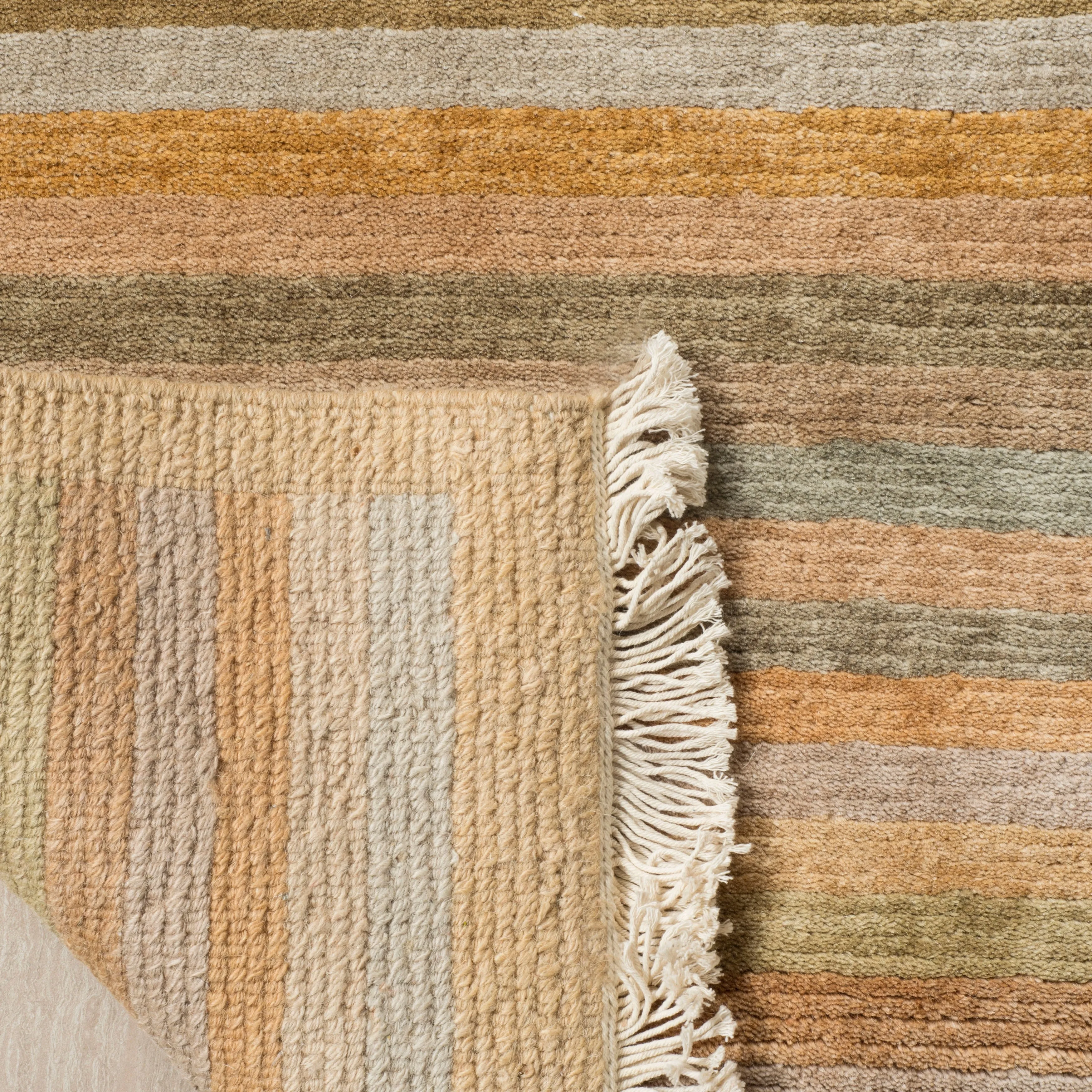 SAFAVIEH Couture Hand-knotted Tibetan Soledade Modern Wool Rug with