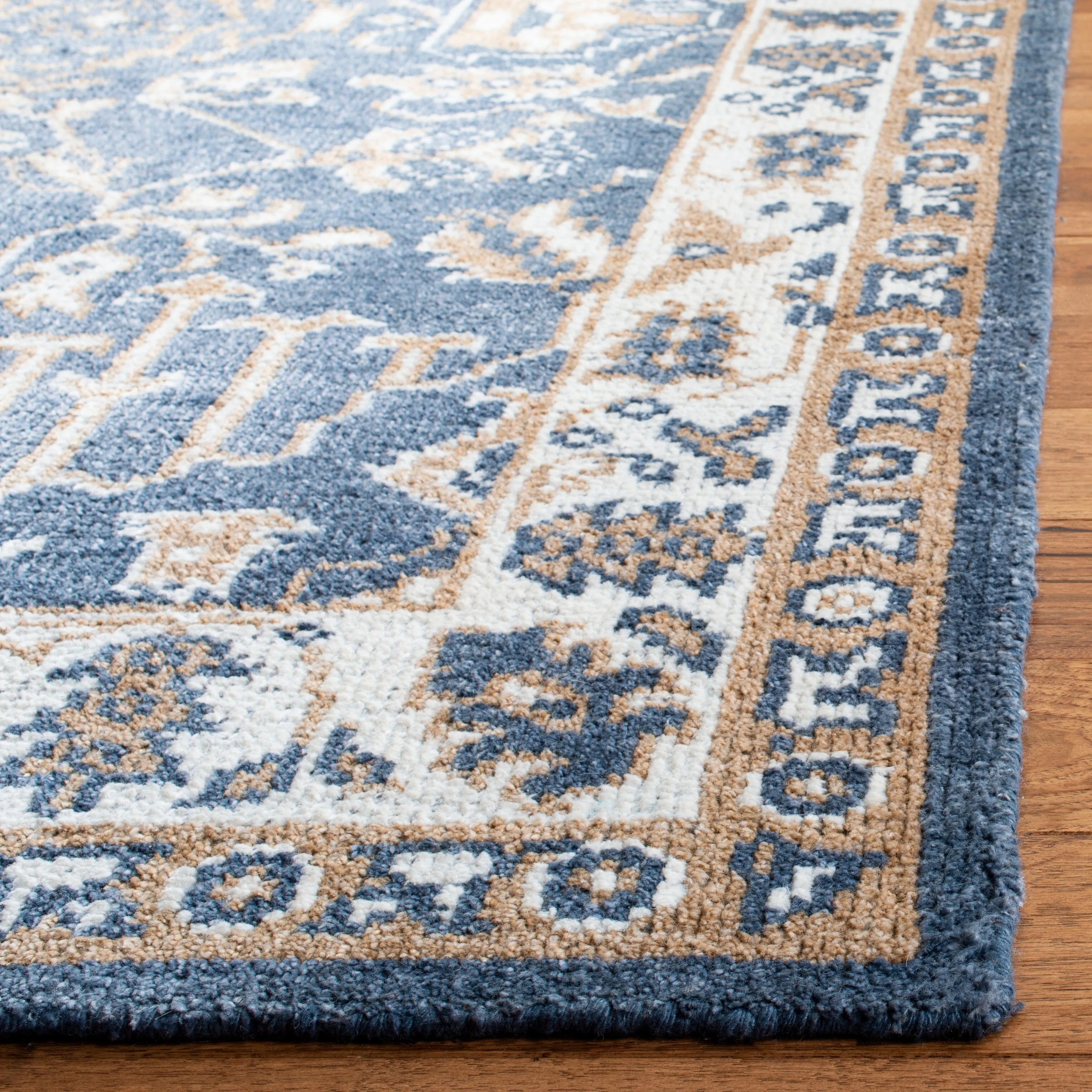 SAFAVIEH Hand-knotted Stone Wash Sigurjona Modern Wool Rug