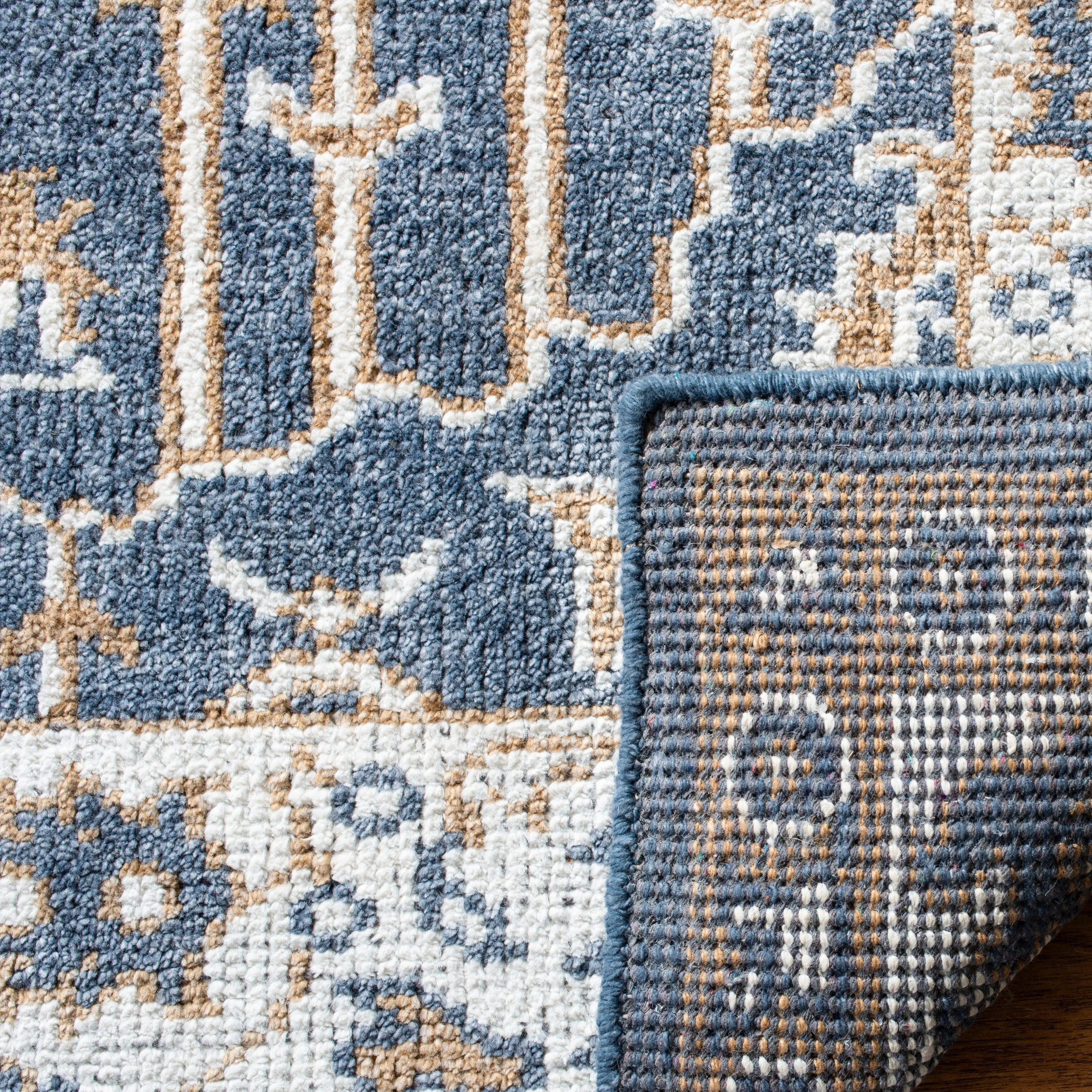 SAFAVIEH Hand-knotted Stone Wash Sigurjona Modern Wool Rug