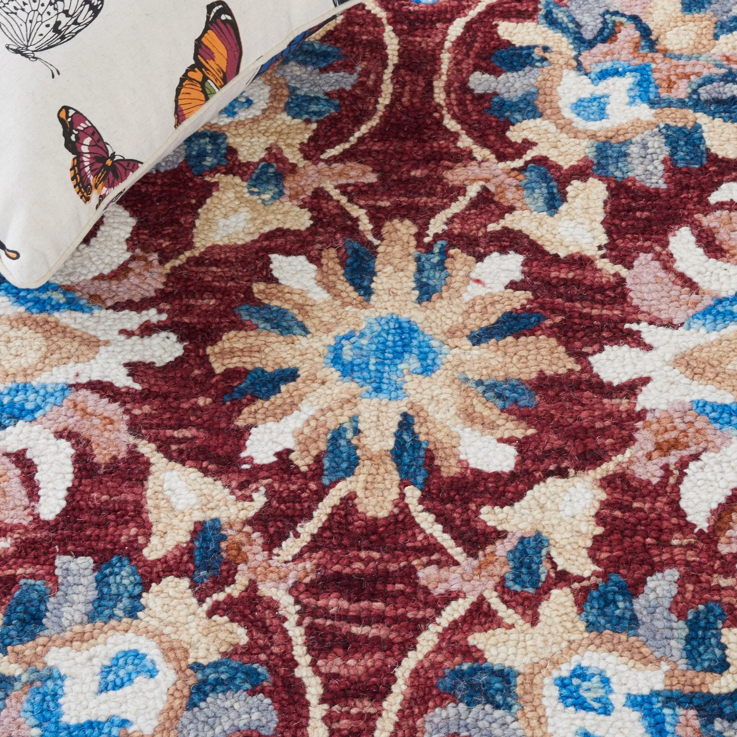 SAFAVIEH Handmade Aspen Orane Floral Braided Tassel Wool Rug
