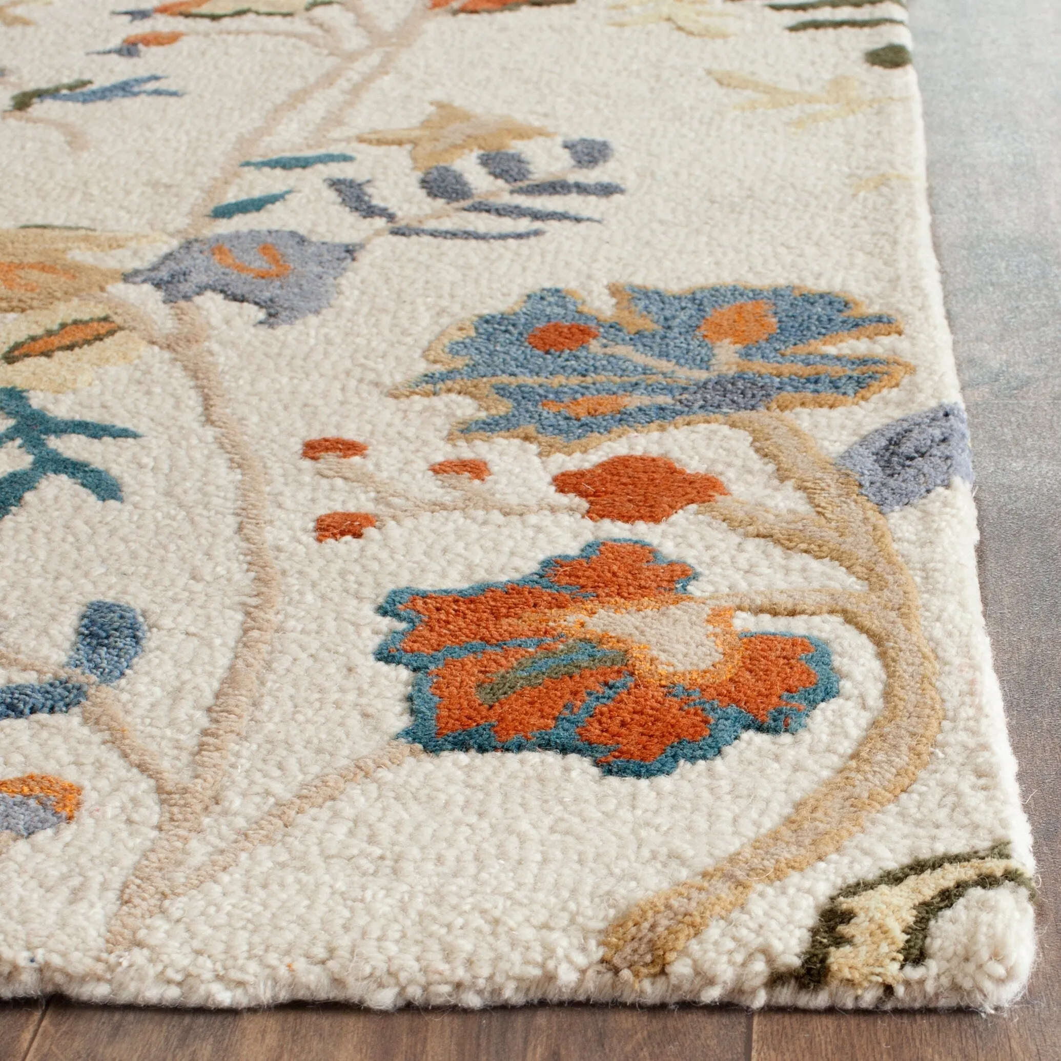 SAFAVIEH Handmade Blossom Philomina Modern Floral Wool Rug