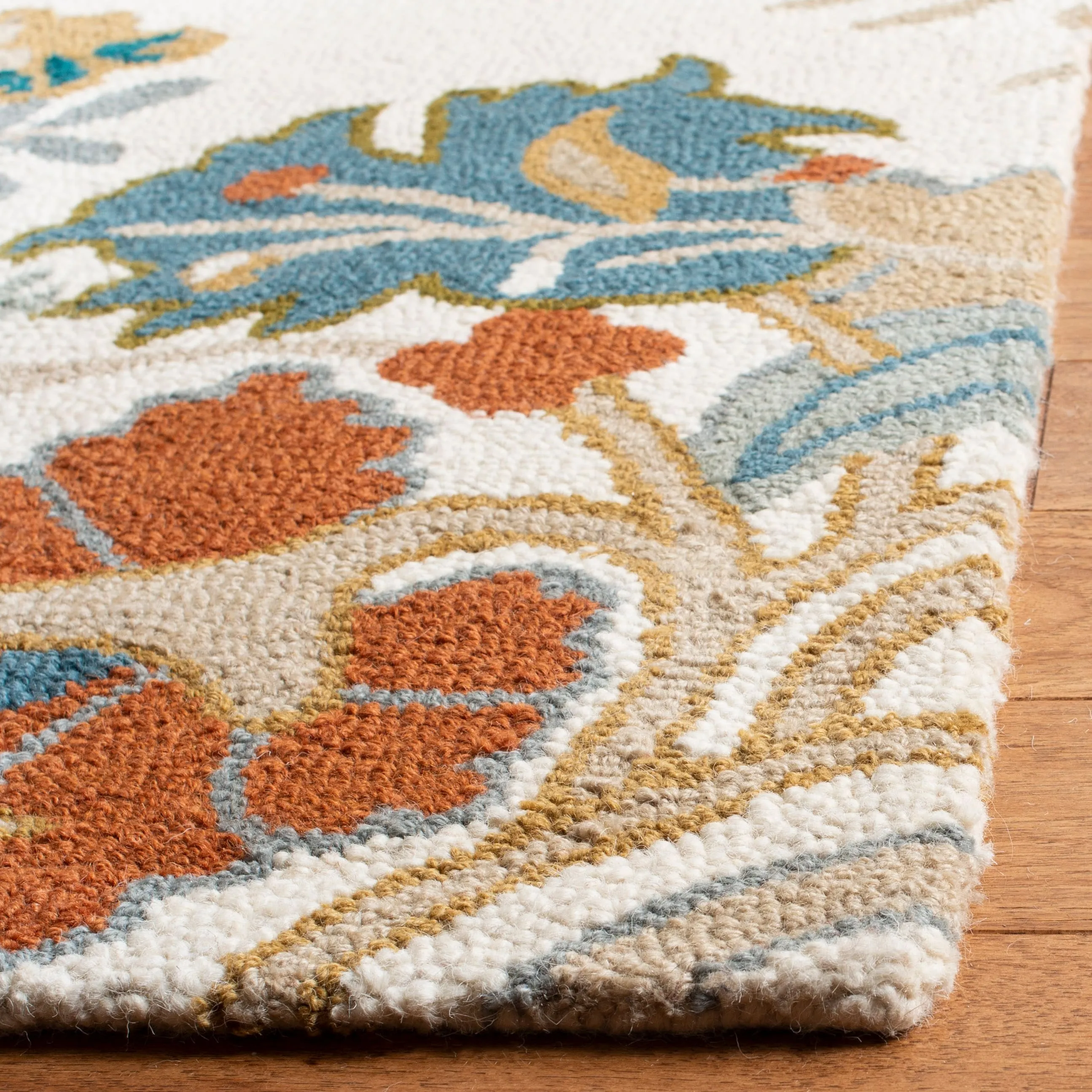 SAFAVIEH Handmade Blossom Philomina Modern Floral Wool Rug