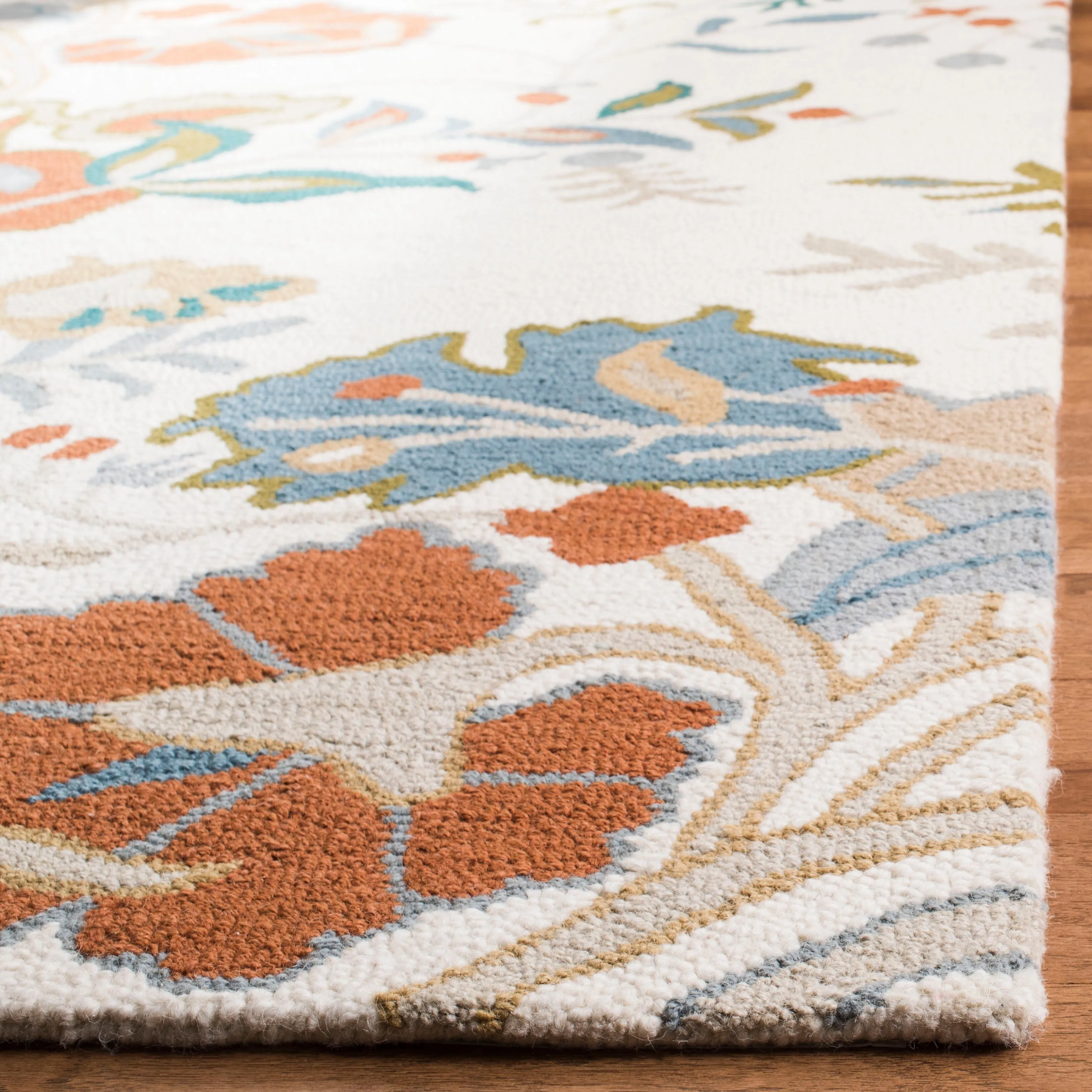 SAFAVIEH Handmade Blossom Philomina Modern Floral Wool Rug