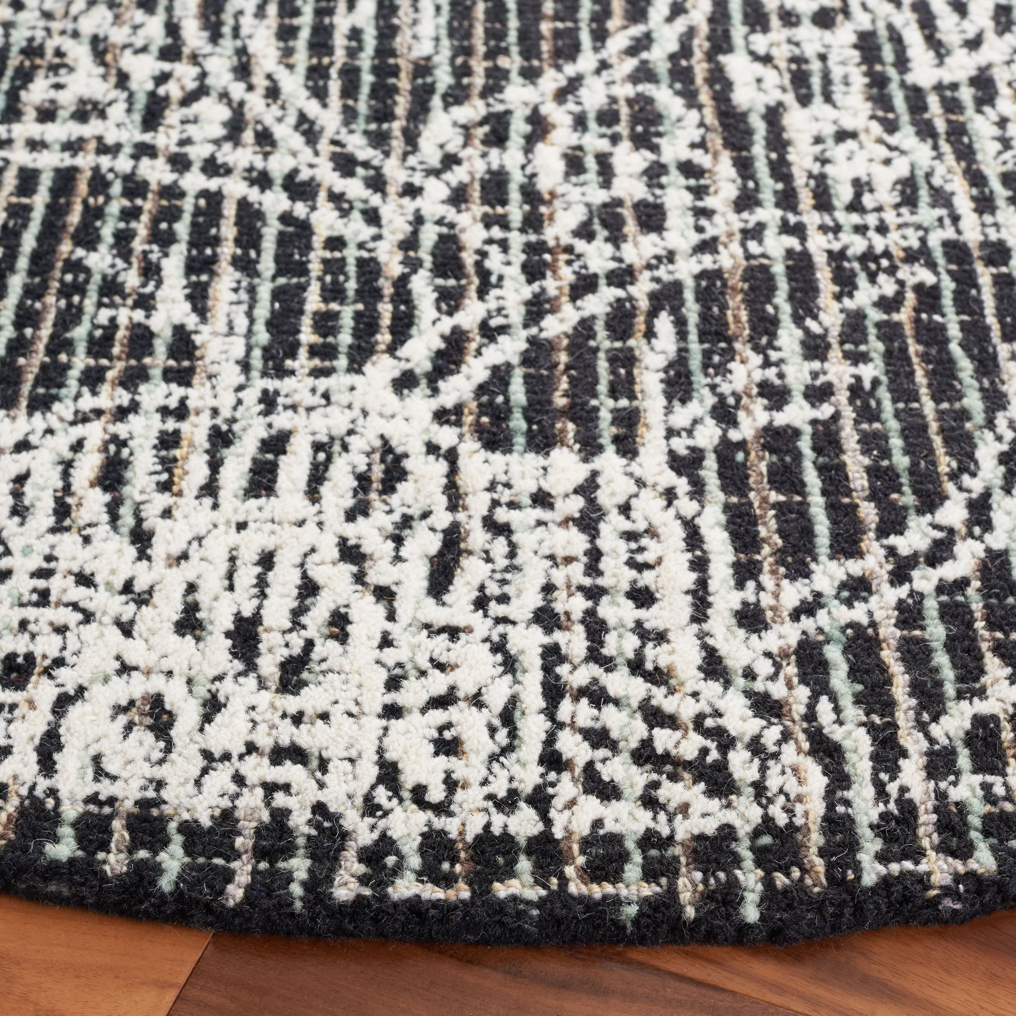 SAFAVIEH Handmade Ebony Dita Modern Floral Wool Rug