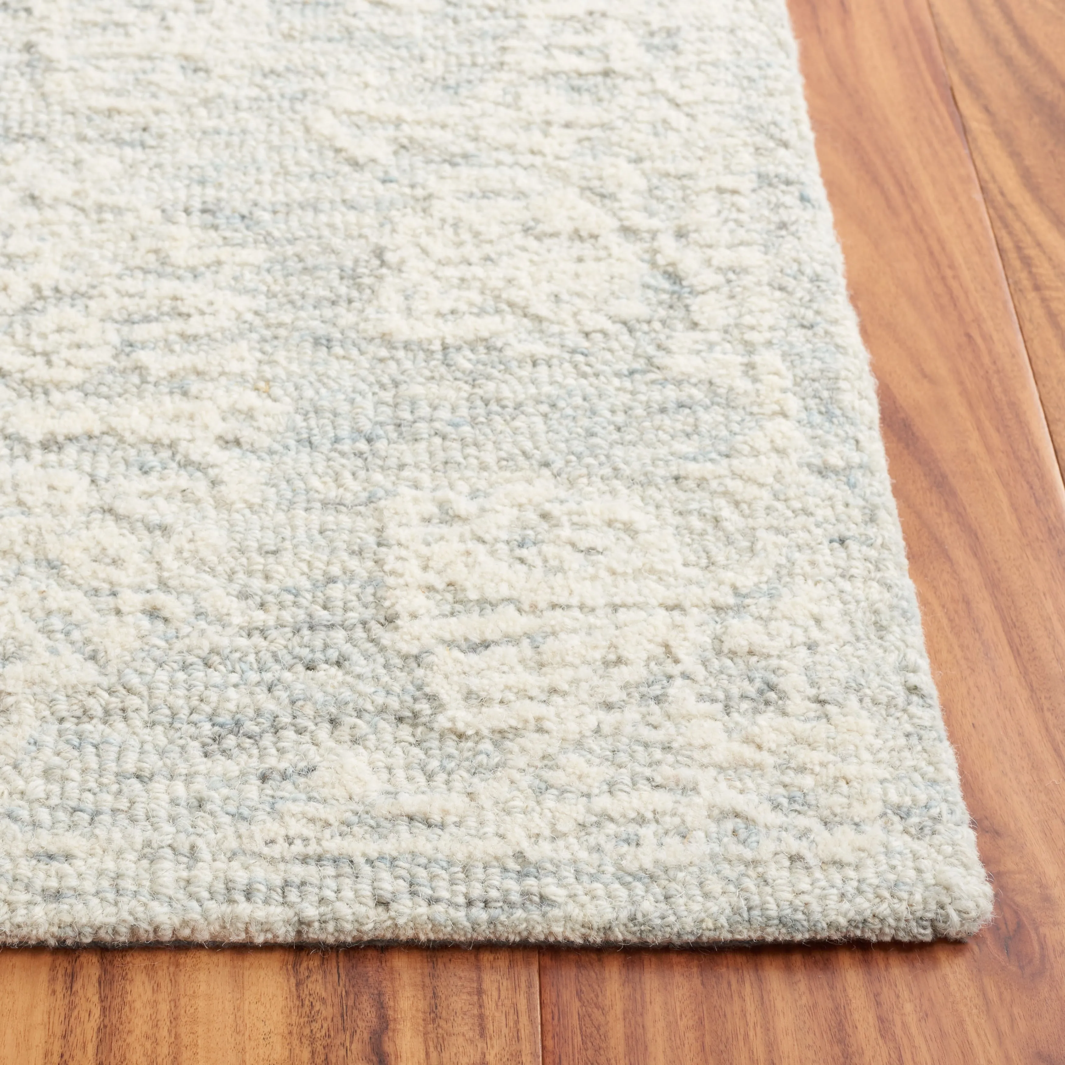 SAFAVIEH Handmade Ebony Muireall Modern Wool Rug
