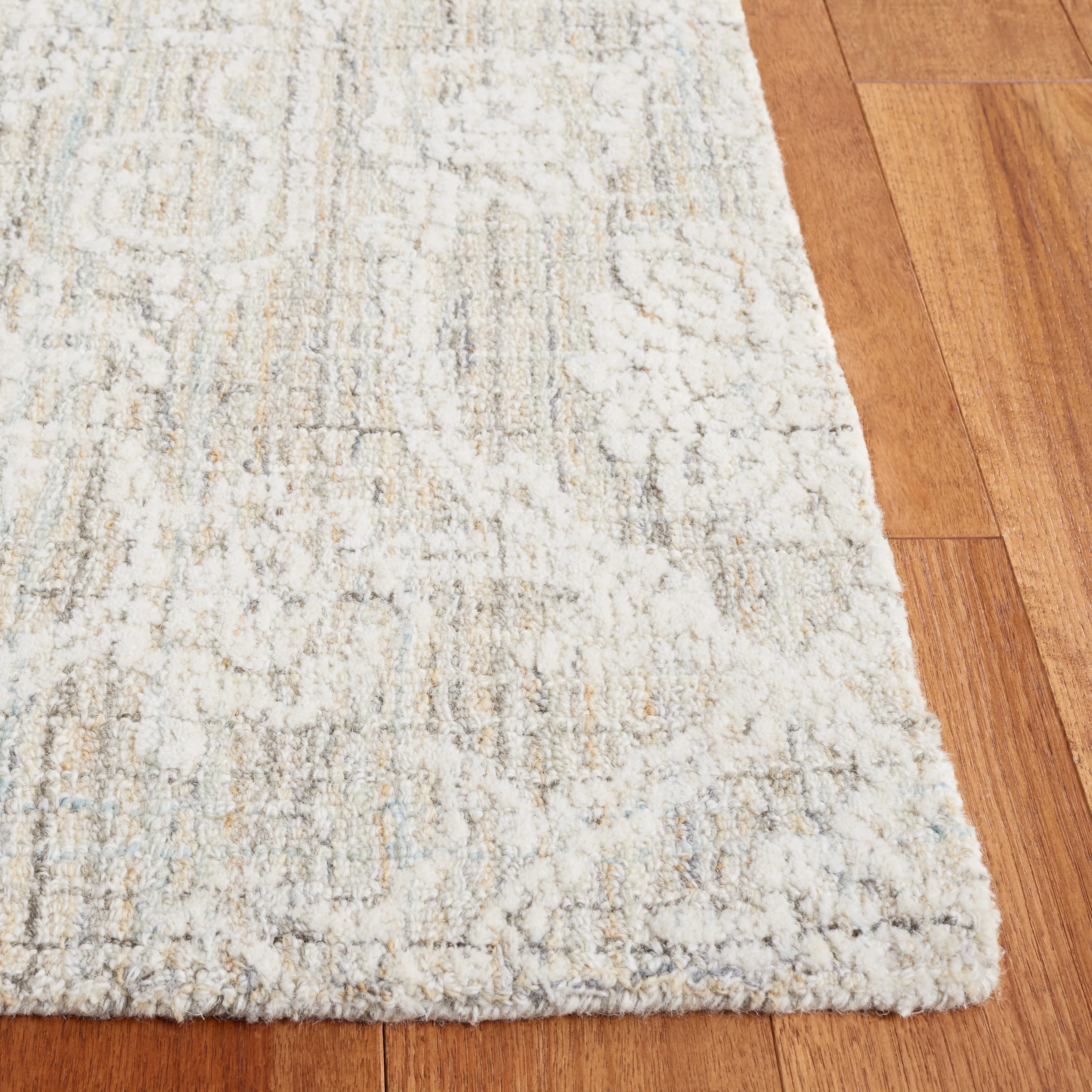 SAFAVIEH Handmade Ebony Nini Modern Wool Rug