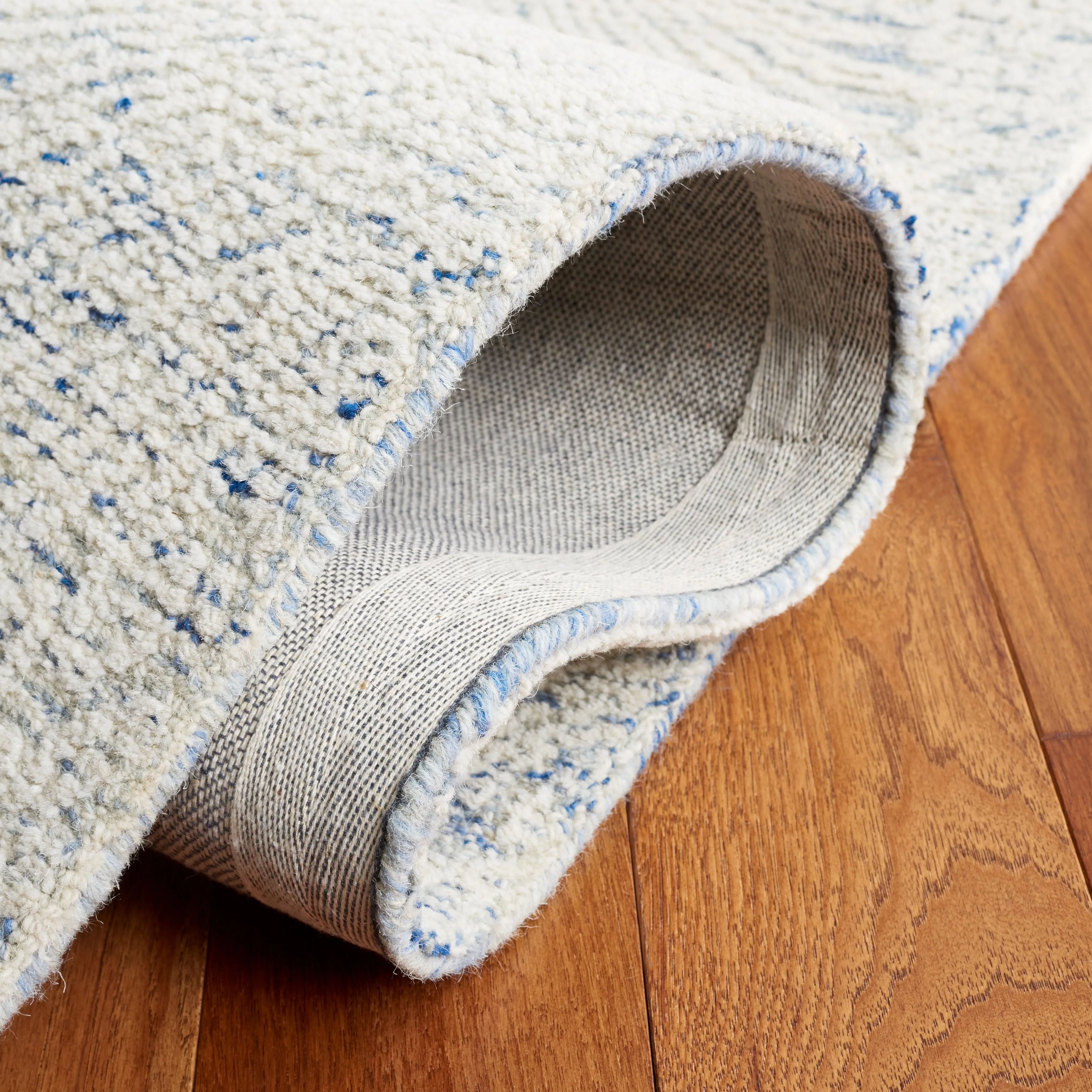 SAFAVIEH Handmade Ebony Siggi Modern Wool Rug