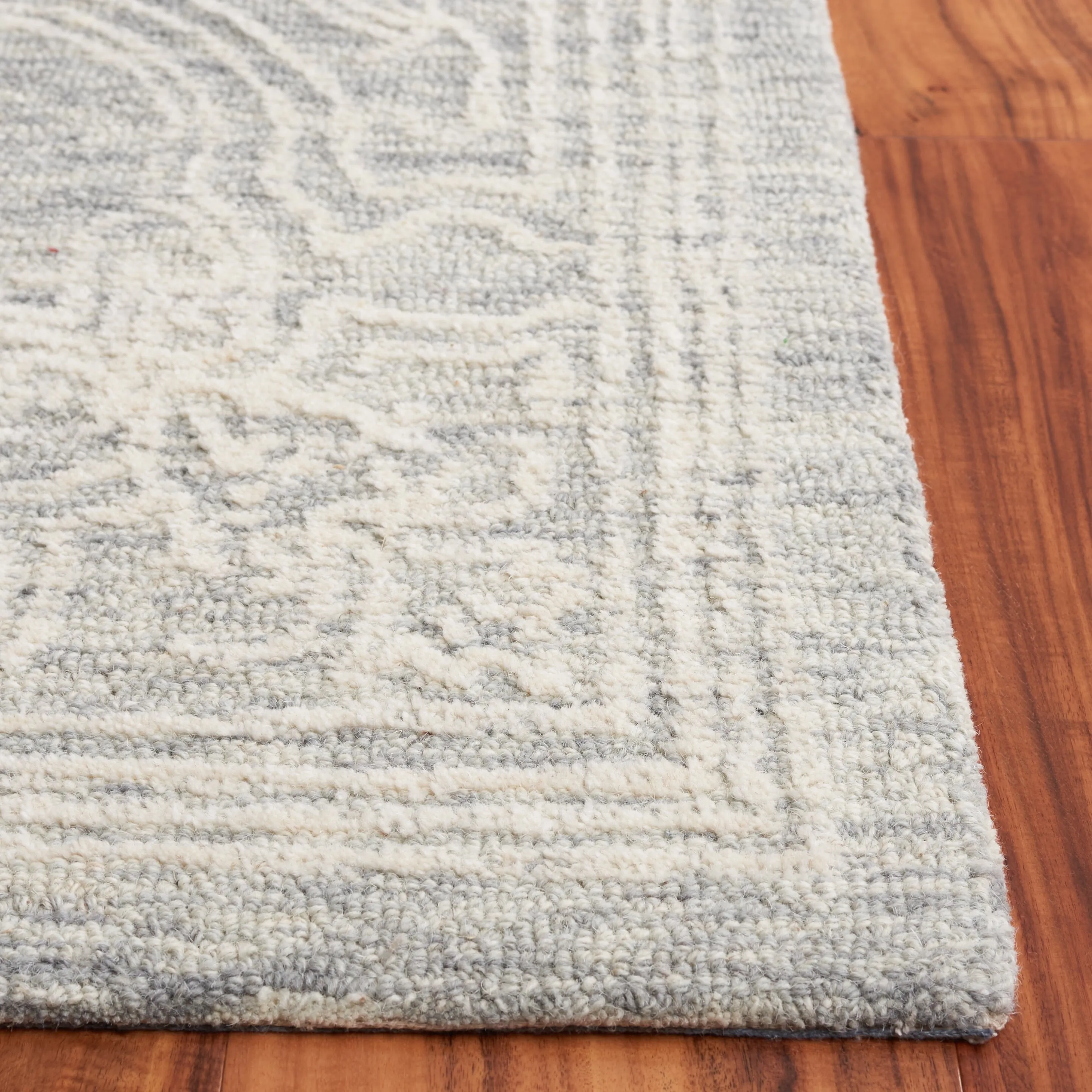SAFAVIEH Handmade Ebony Tammy Modern Wool Rug