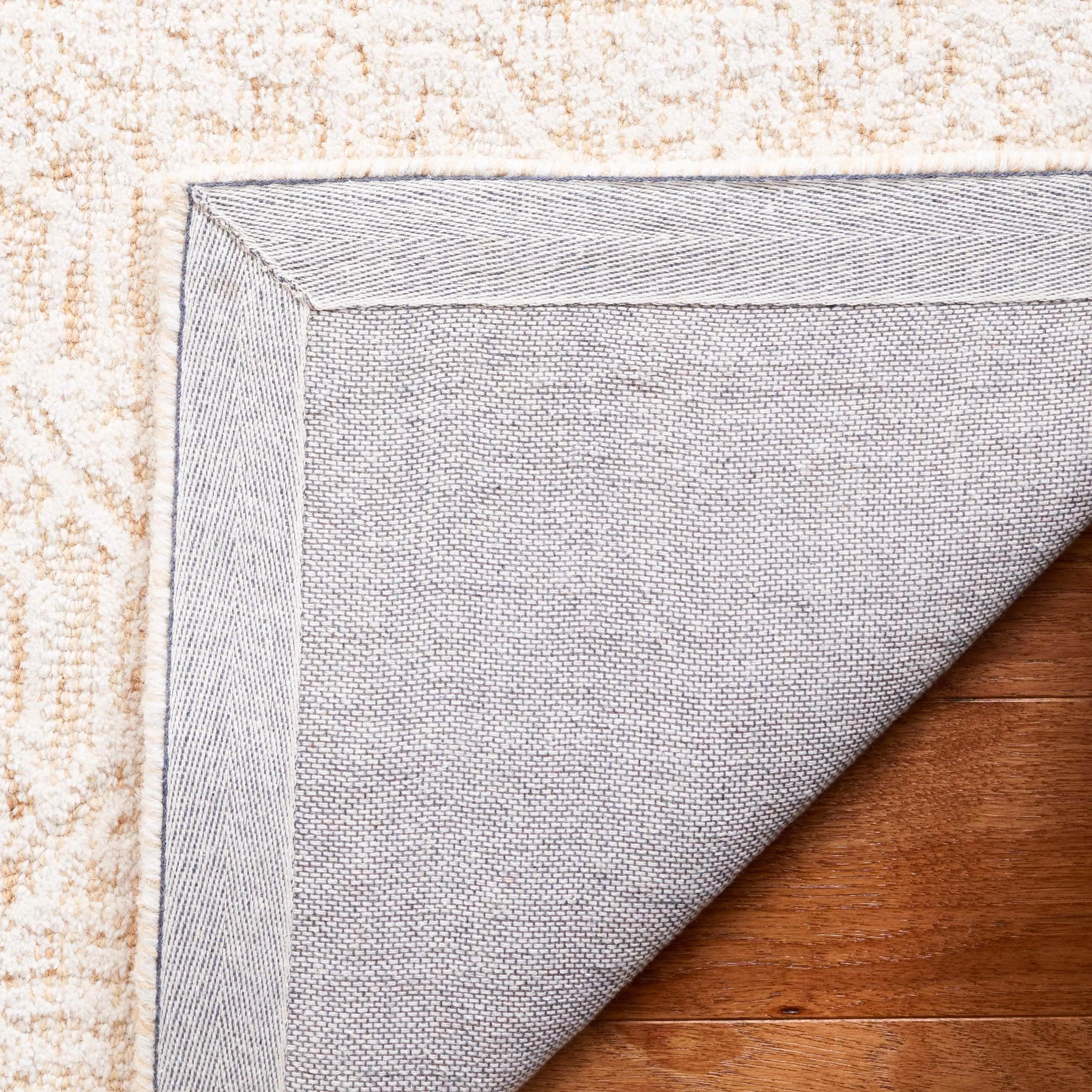 SAFAVIEH Handmade Ebony Vuokko Modern Wool Rug