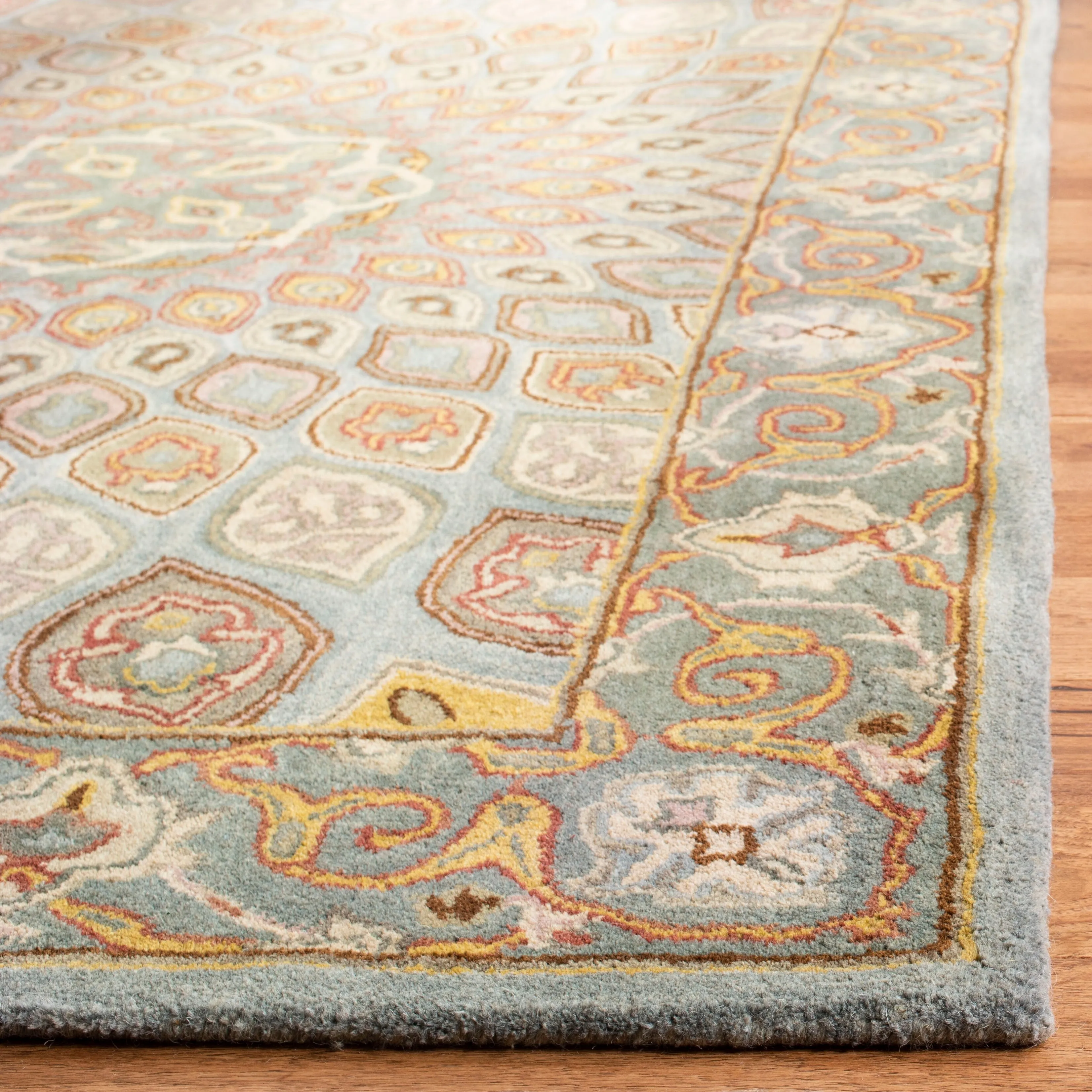 SAFAVIEH Handmade Heritage Wayfarer Traditional Oriental Wool Rug
