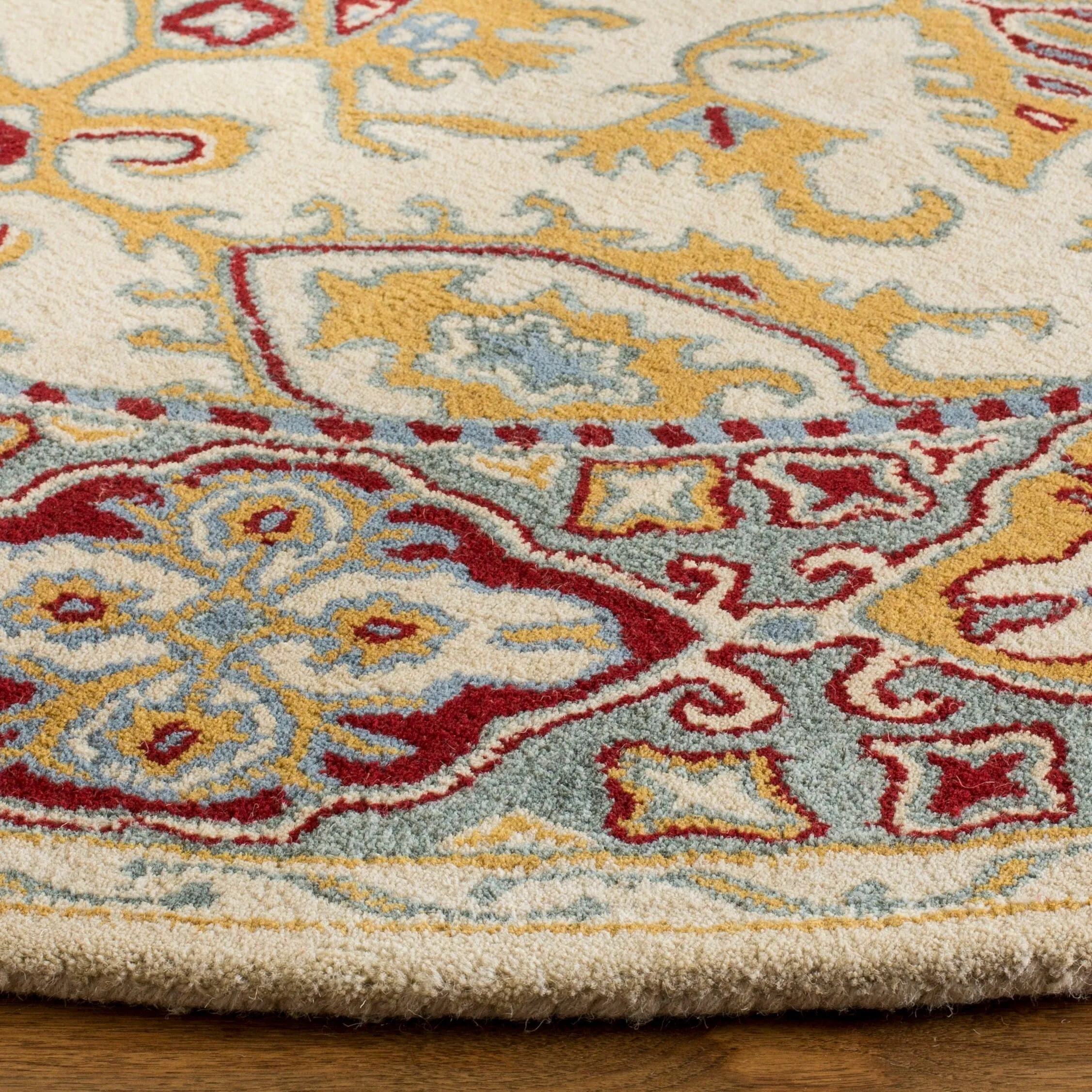 SAFAVIEH Handmade Heritage Wildfire Traditional Oriental Wool Rug