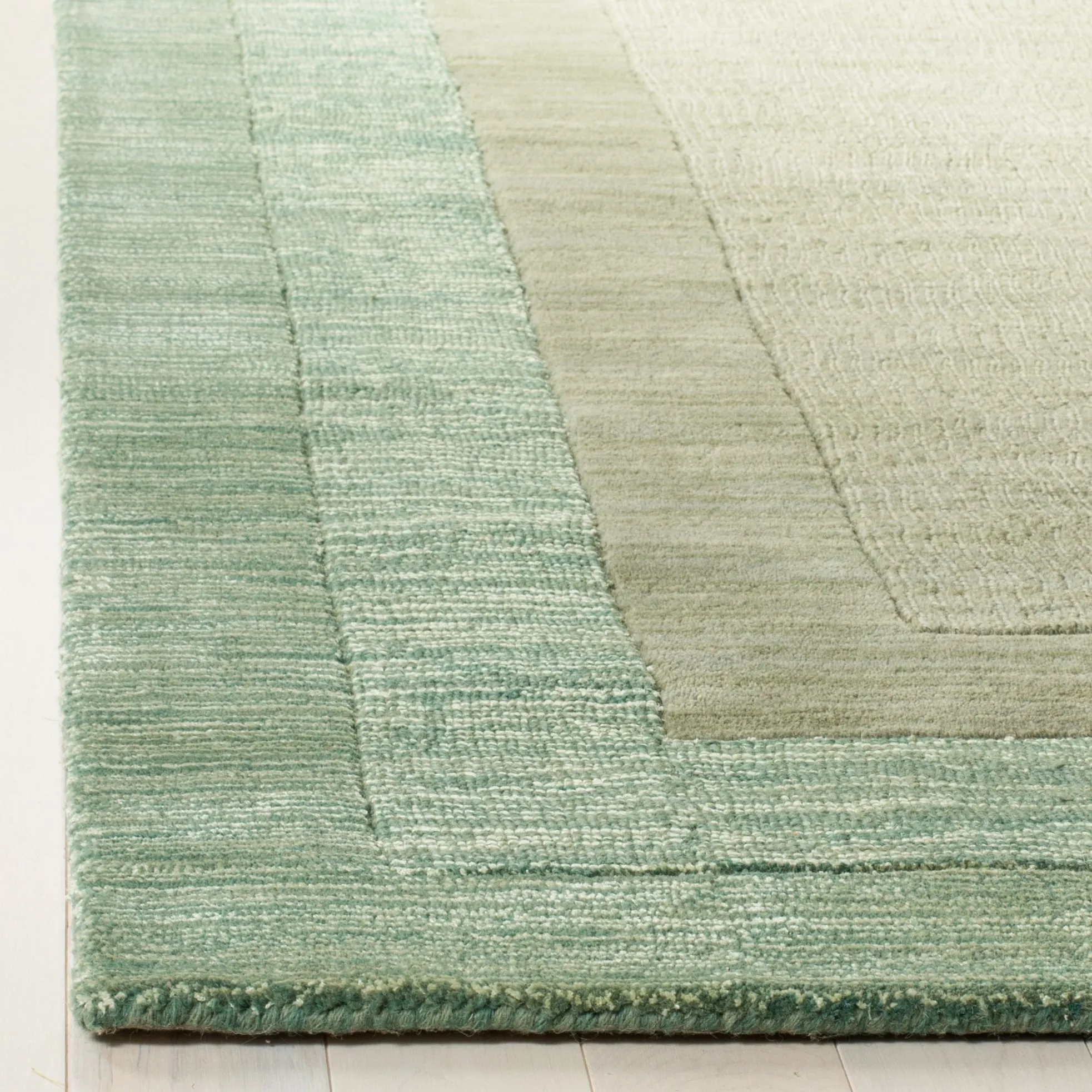 SAFAVIEH Handmade Impressions Nazmie Modern Wool Rug