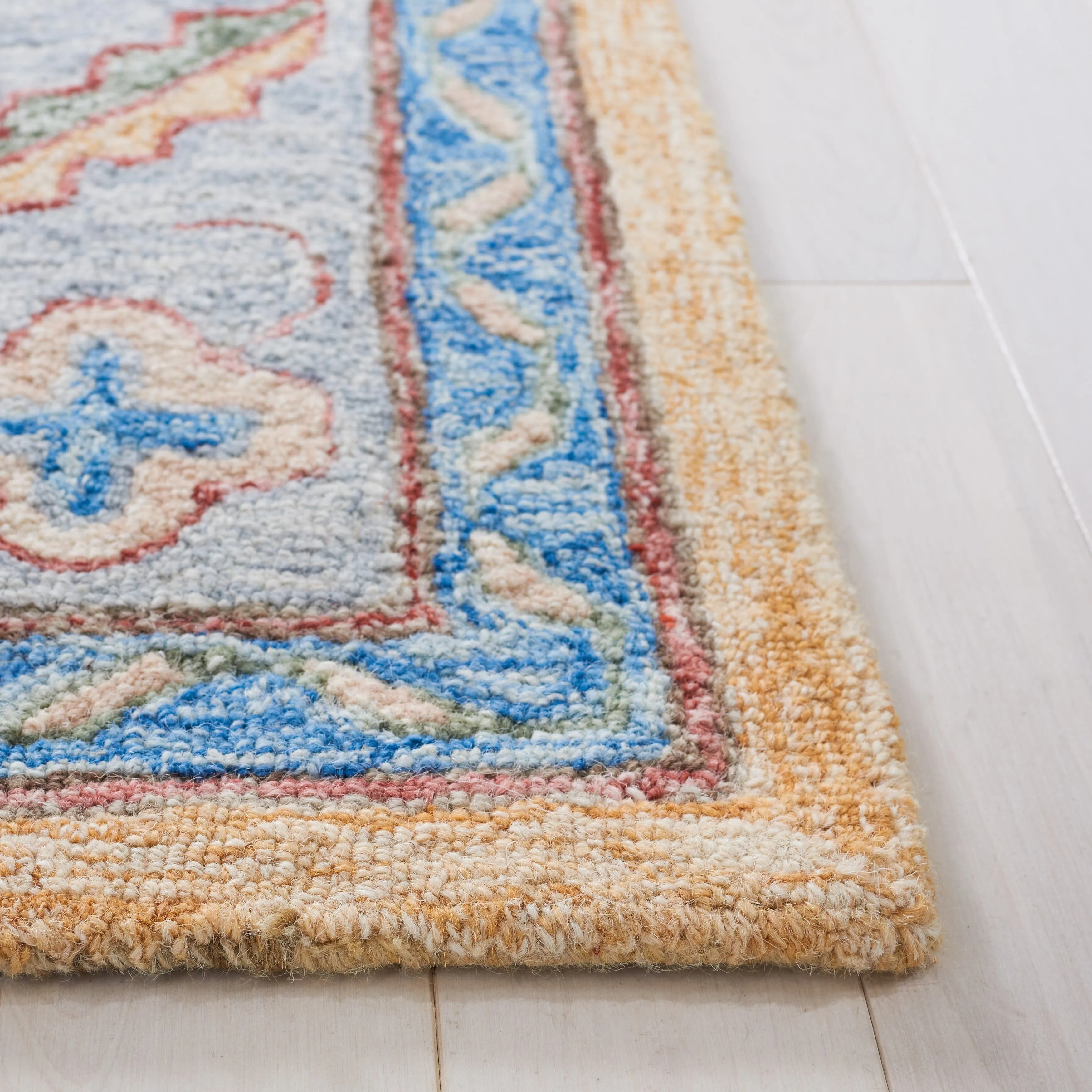 SAFAVIEH Handmade Metro Bert Medallion Wool Rug