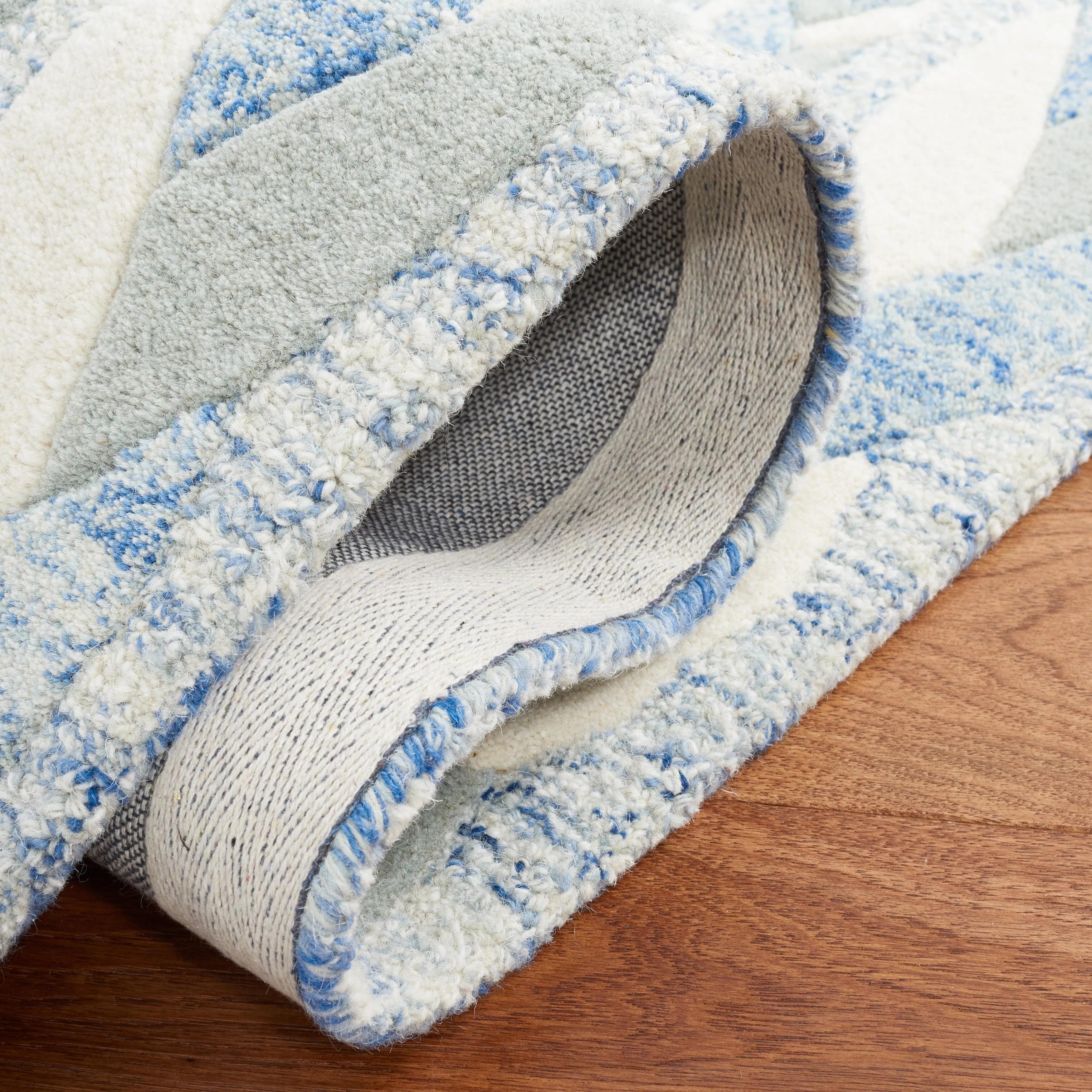 SAFAVIEH Handmade Metro Zenta Wool Rug