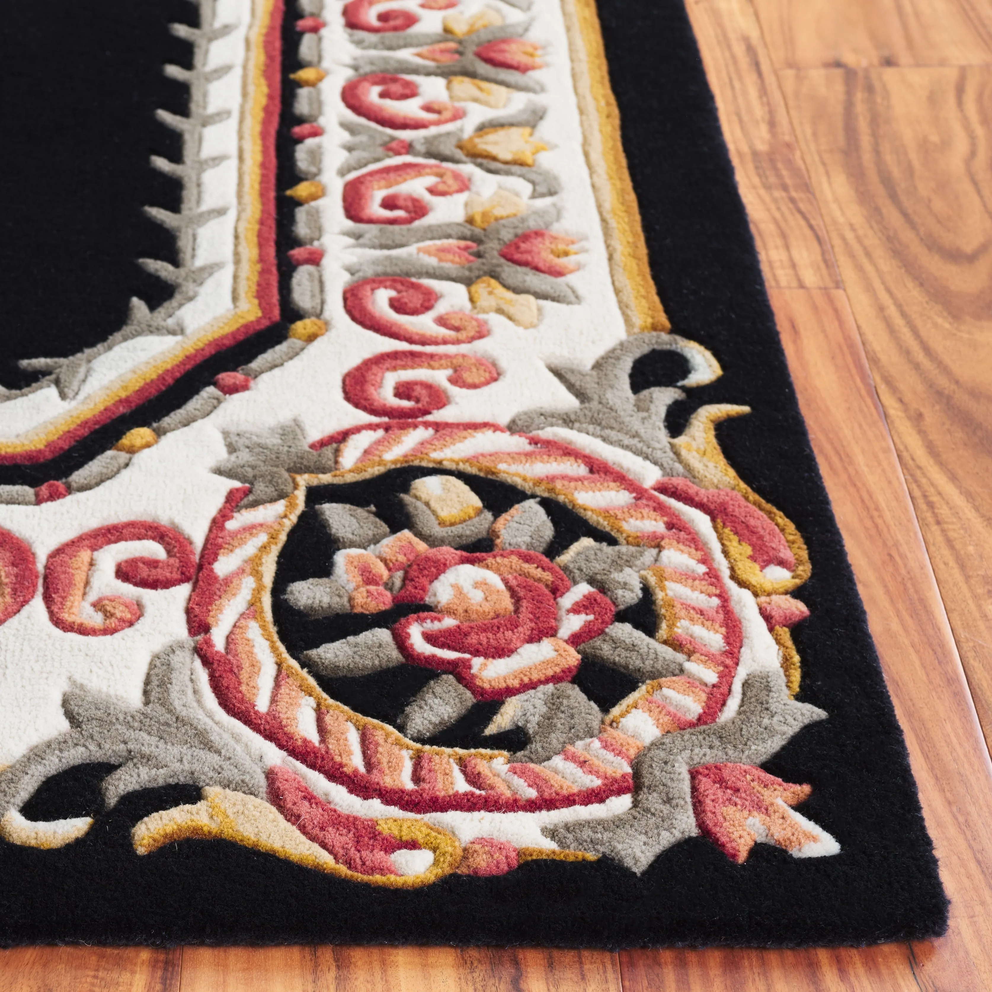 SAFAVIEH. Handmade Naples Cathelyne Traditional Wool Rug