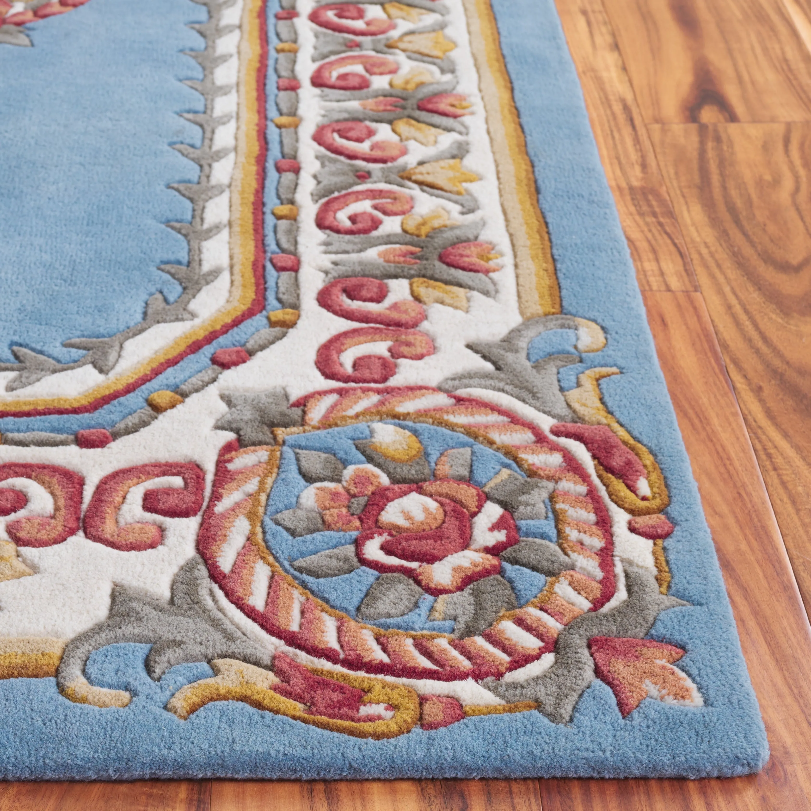 SAFAVIEH. Handmade Naples Cathelyne Traditional Wool Rug