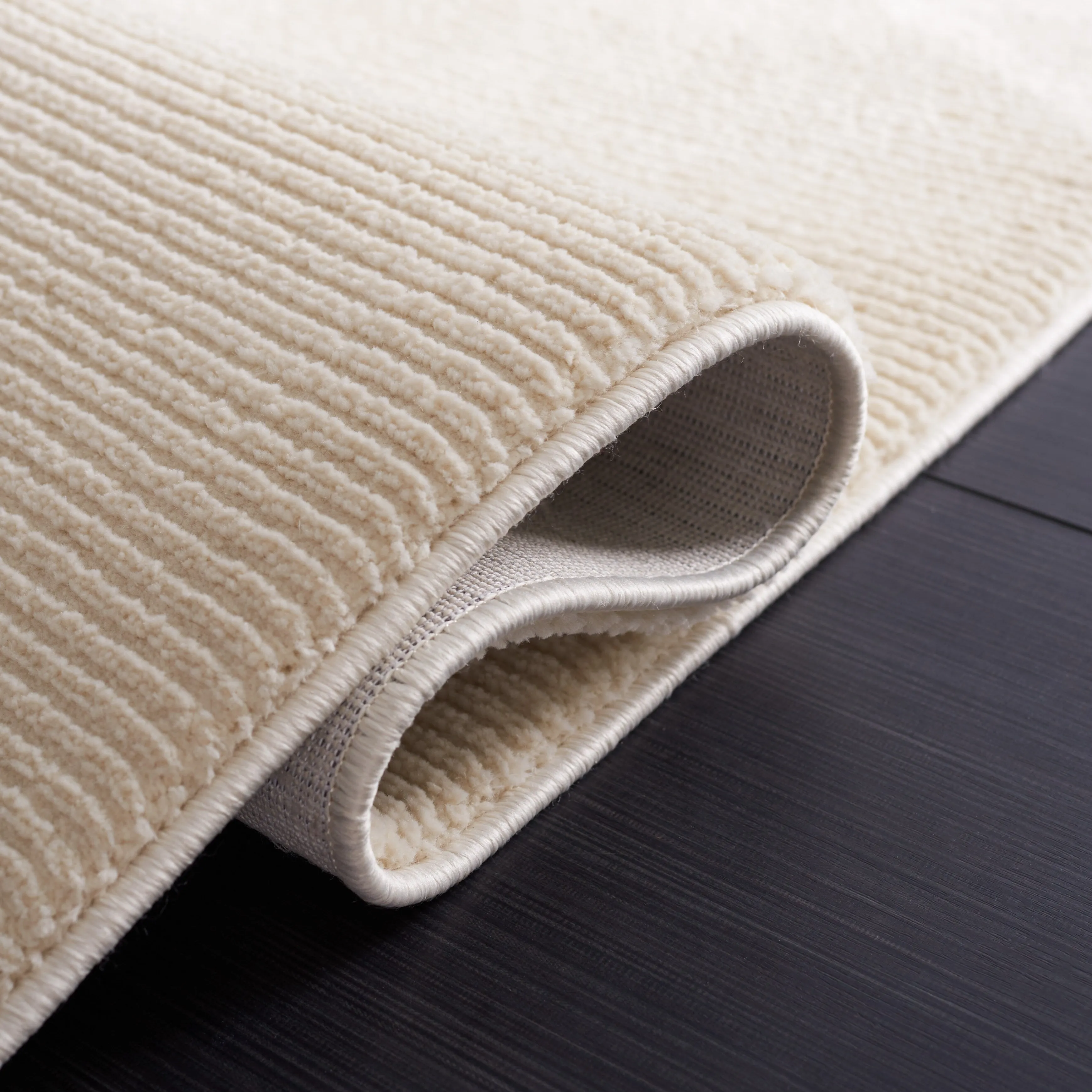 SAFAVIEH Revive Avie Solid Rug