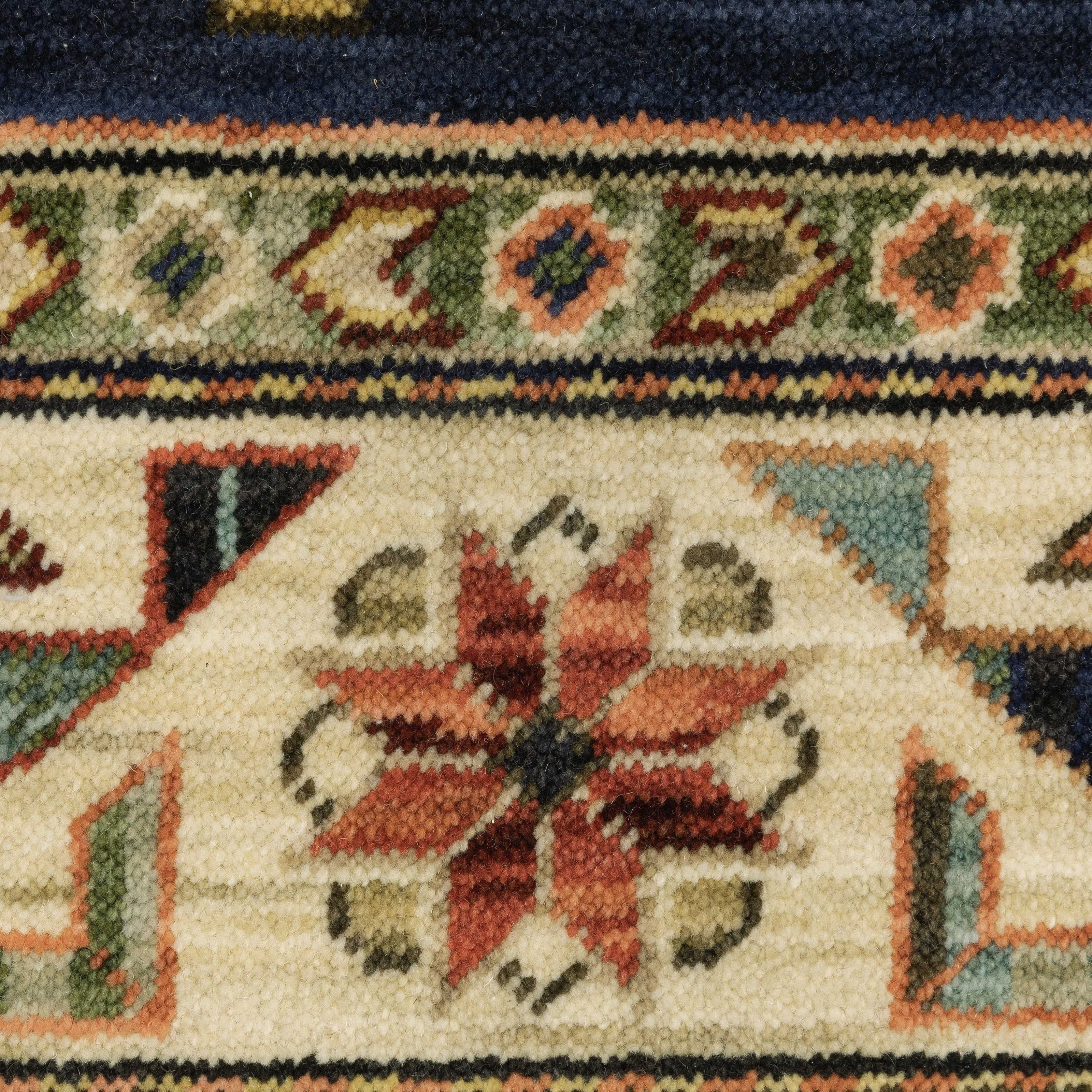 Style Haven Leander Tribal Medallion Navy/ Multi Fringed Wool Blend Area Rug.