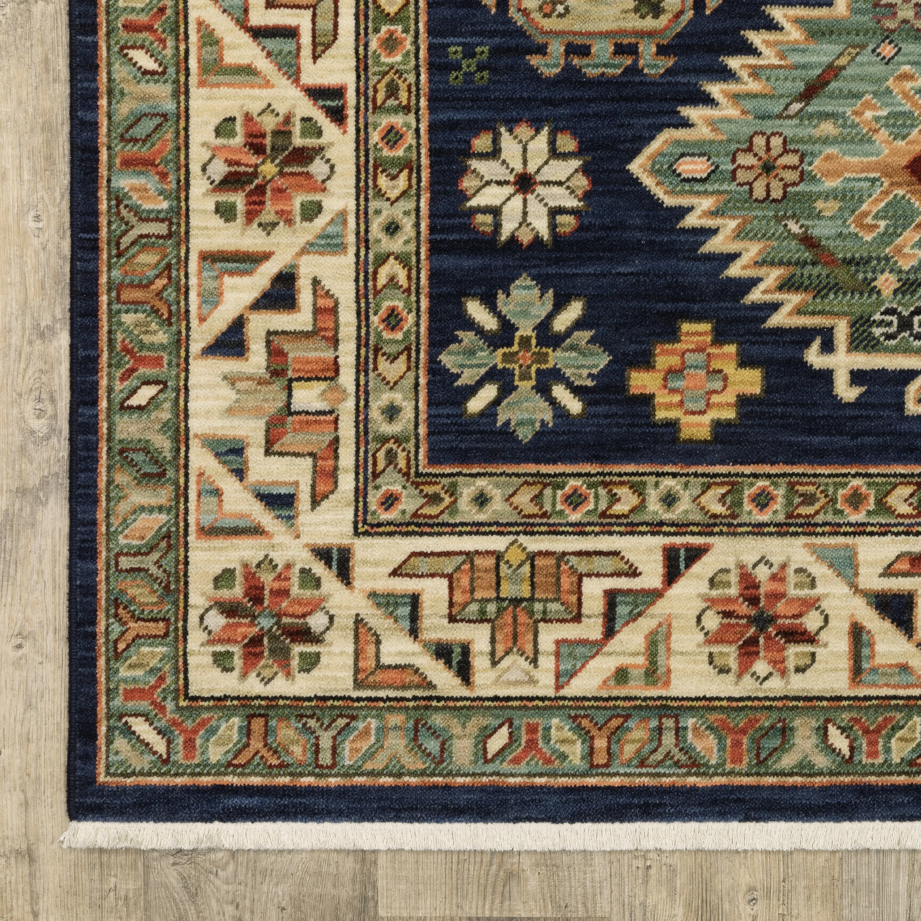 Style Haven Leander Tribal Medallion Navy/ Multi Fringed Wool Blend Area Rug.