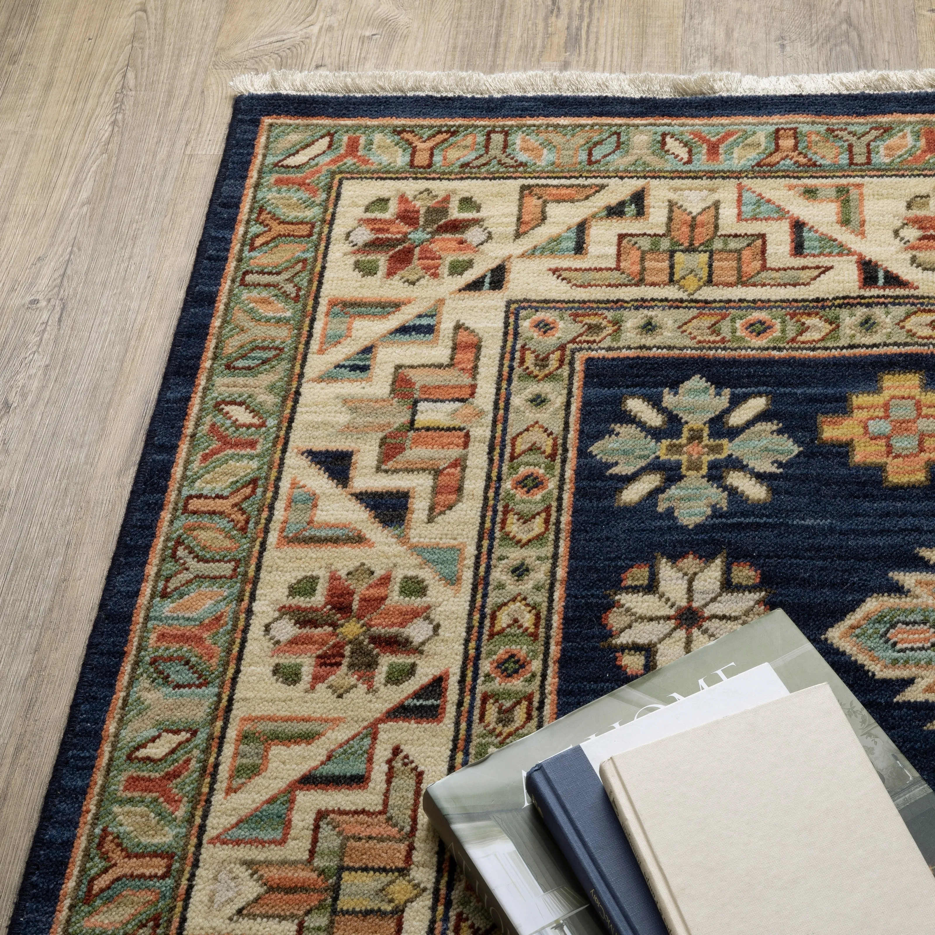 Style Haven Leander Tribal Medallion Navy/ Multi Fringed Wool Blend Area Rug.
