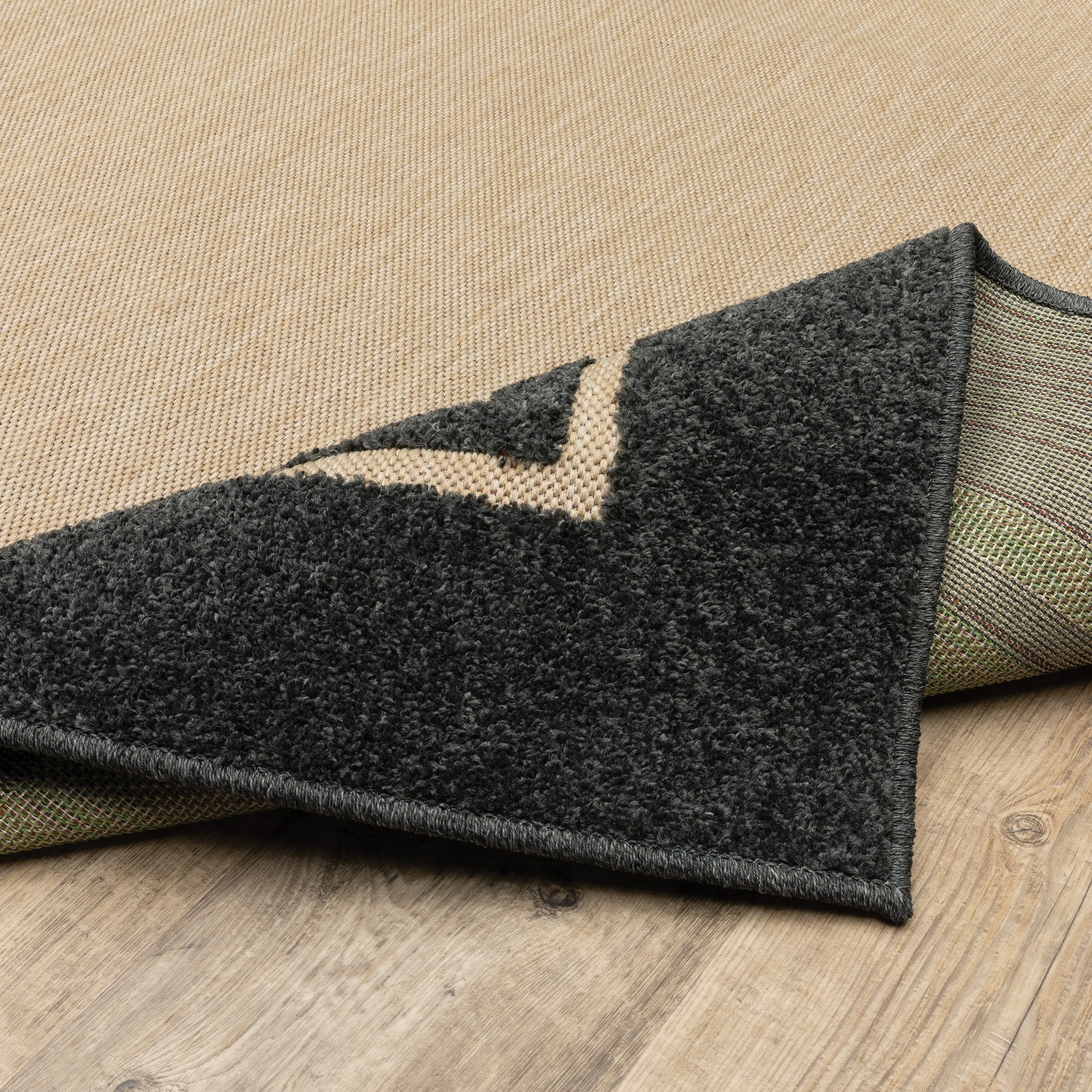 Vista Home Capri Mixed Pile Bordered Black/Tan Indoor-Outdoor Area Rug.