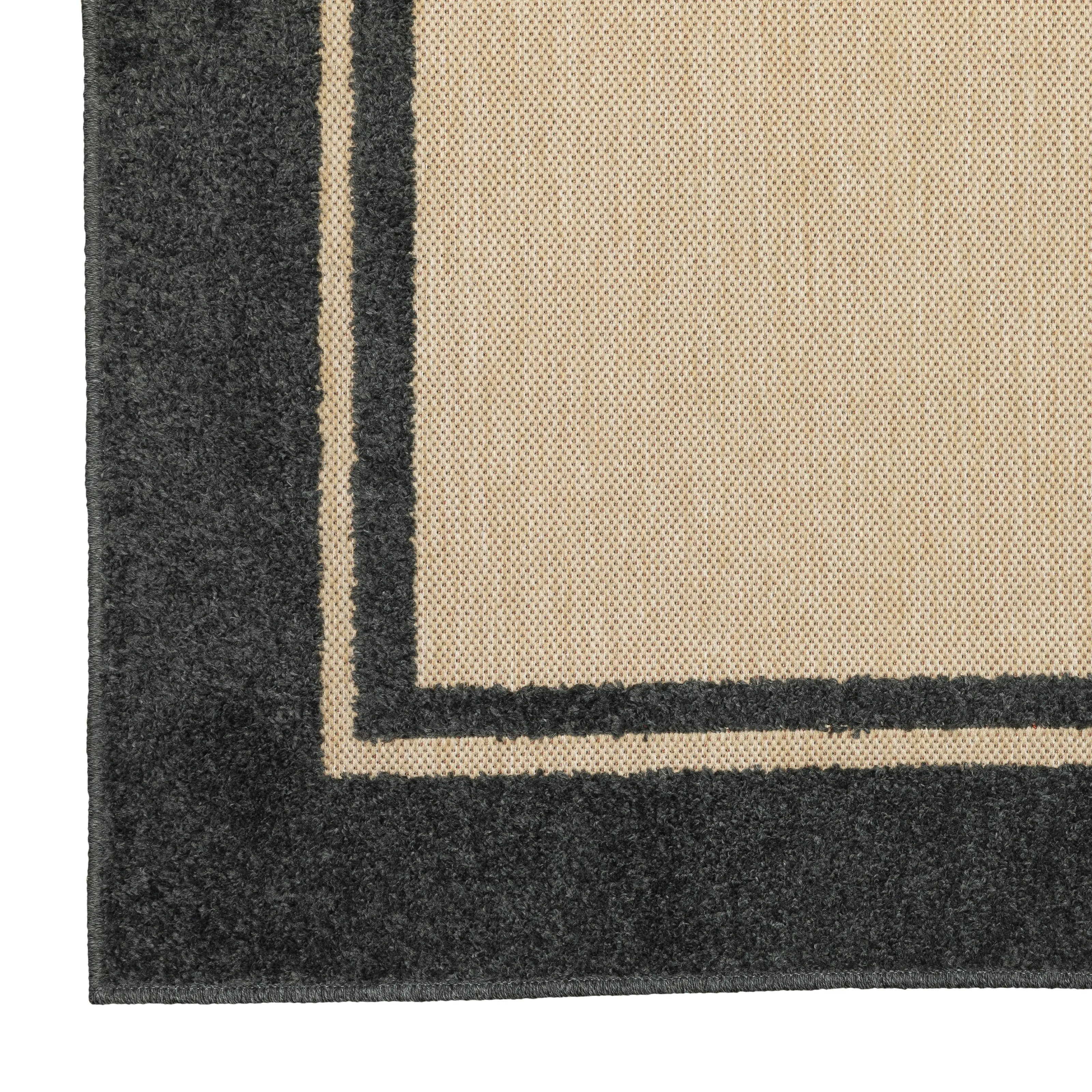 Vista Home Capri Mixed Pile Bordered Black/Tan Indoor-Outdoor Area Rug.