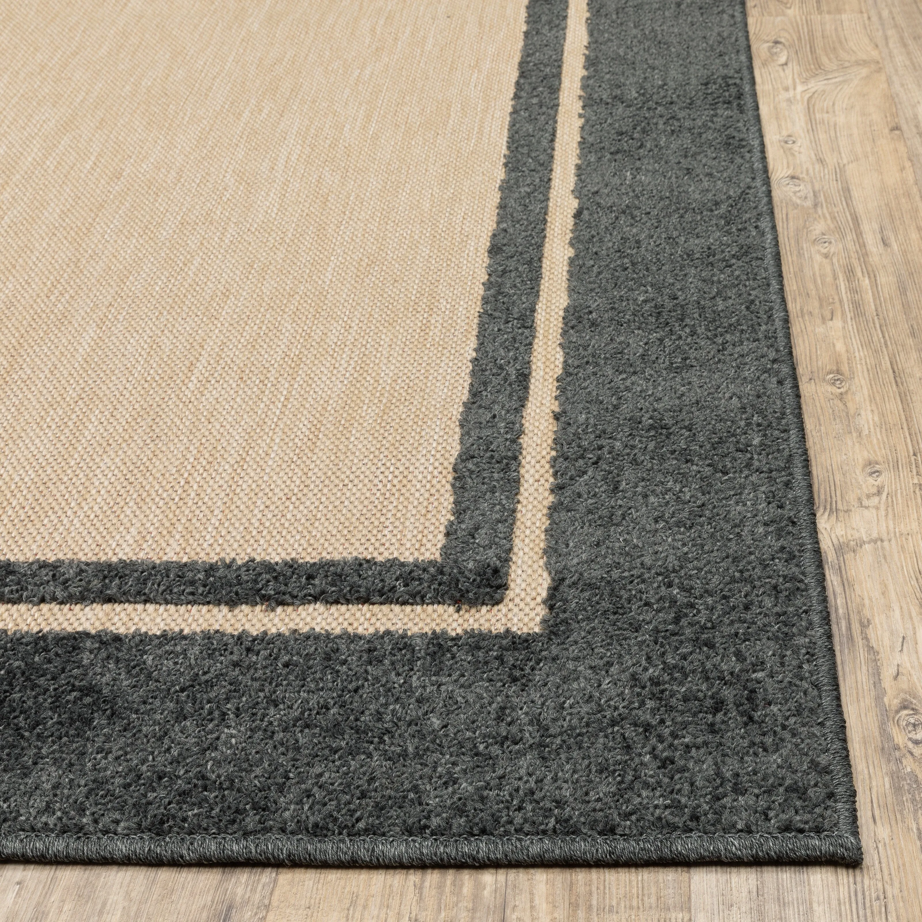 Vista Home Capri Mixed Pile Bordered Black/Tan Indoor-Outdoor Area Rug.