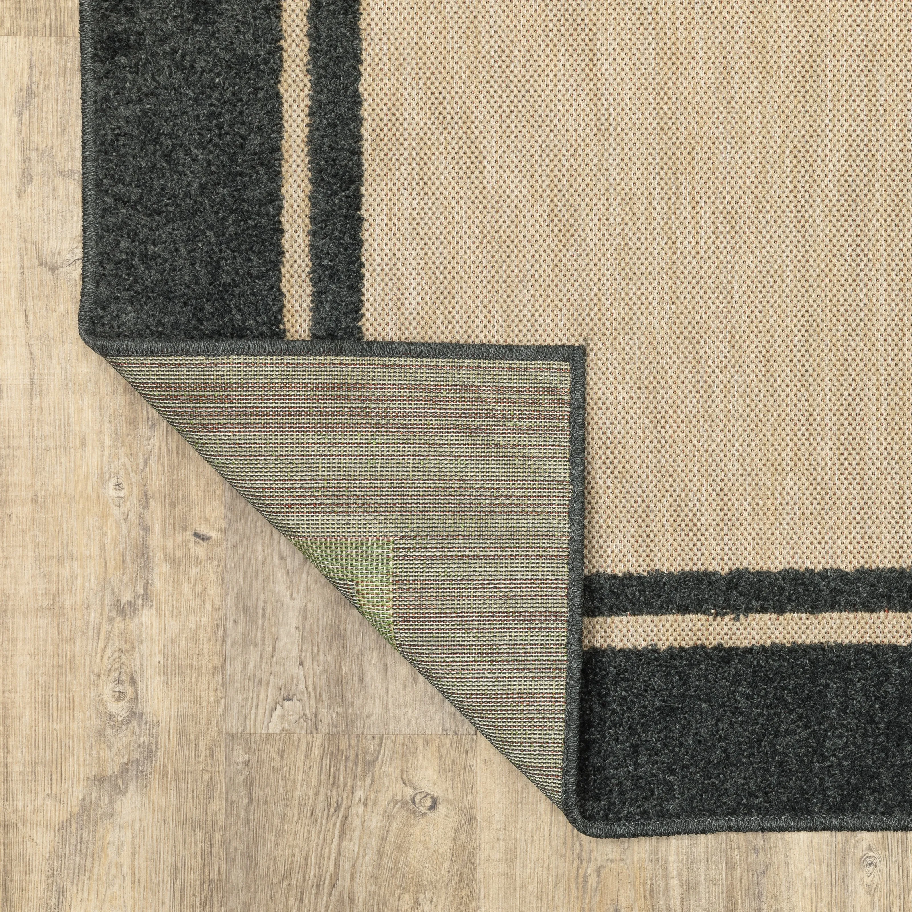 Vista Home Capri Mixed Pile Bordered Black/Tan Indoor-Outdoor Area Rug.